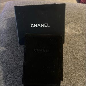 Gold Chanel dangle earrings never wore. Was a gift but not my style.